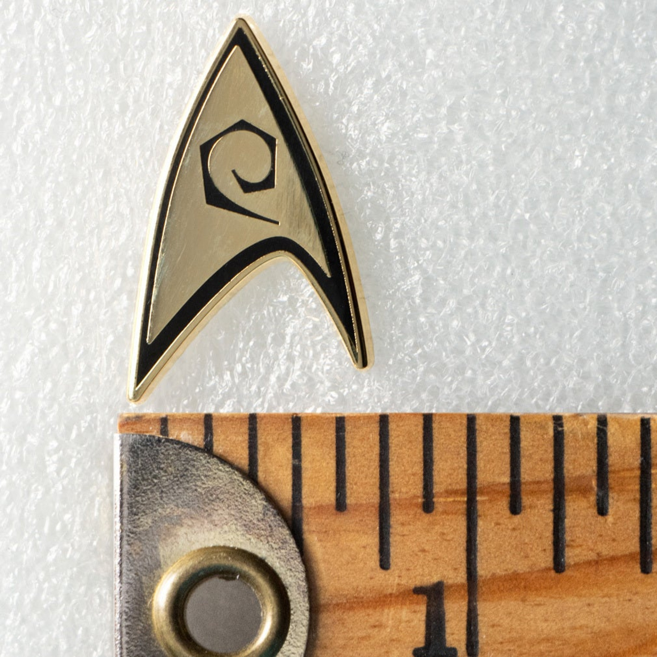 thumbnail image 2 of Metal Starfleet Operations Badge - Engineering - Star Trek Beyond - Film Replica 2 of 3
