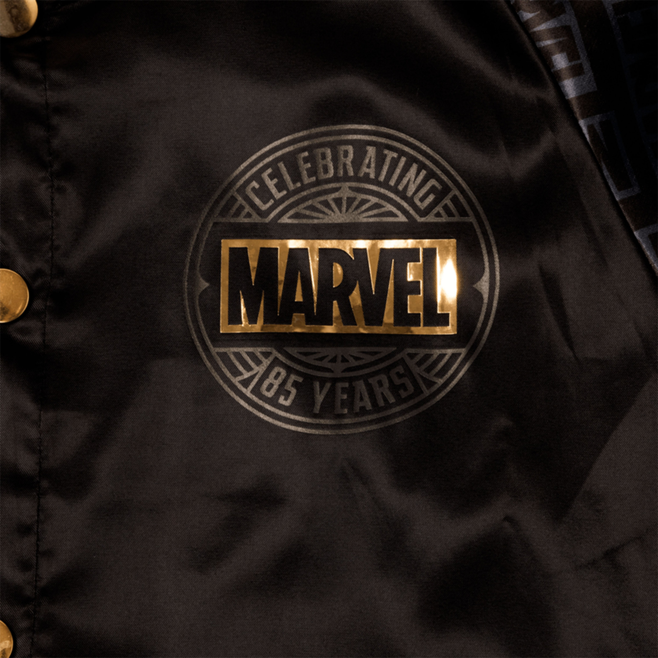 Marvel 85th Anniversary Golden Logo Satin Bomber Jacket By Loungefly